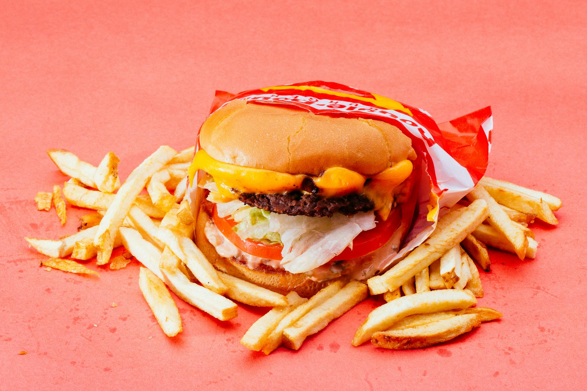 photo of cheeseburger and french fries